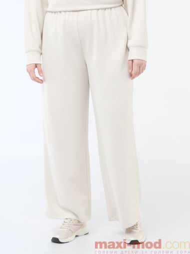Широки панталони от оребрена еластична материя 