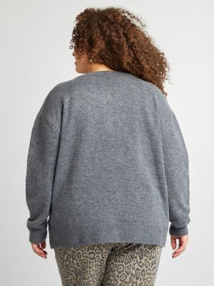 Вълнена жиелетка с копчета