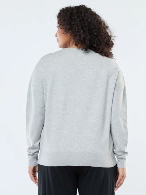 Лека жилетка с V-образно деколте с копчета