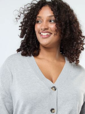 Лека жилетка с V-образно деколте с копчета