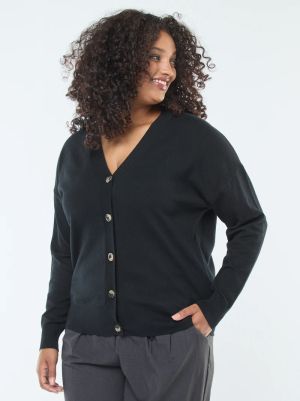 Лека жилетка с V-образно деколте с копчета