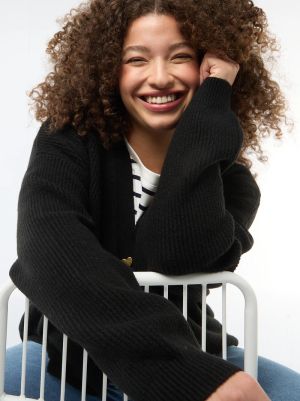 Жилетка с V-образно деколте с копчета