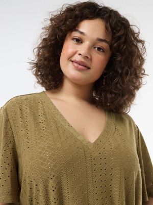 Дамска блуза с перфорирана плетка