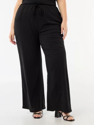 Широк дамски панталон голям размер