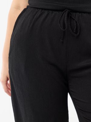 Широк дамски панталон голям размер